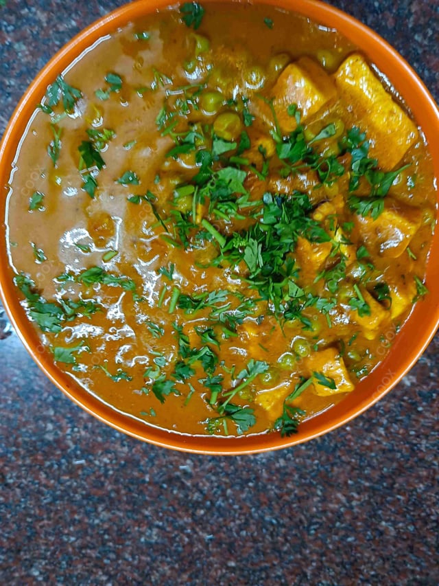 Delicious Matar Paneer prepared by COOX