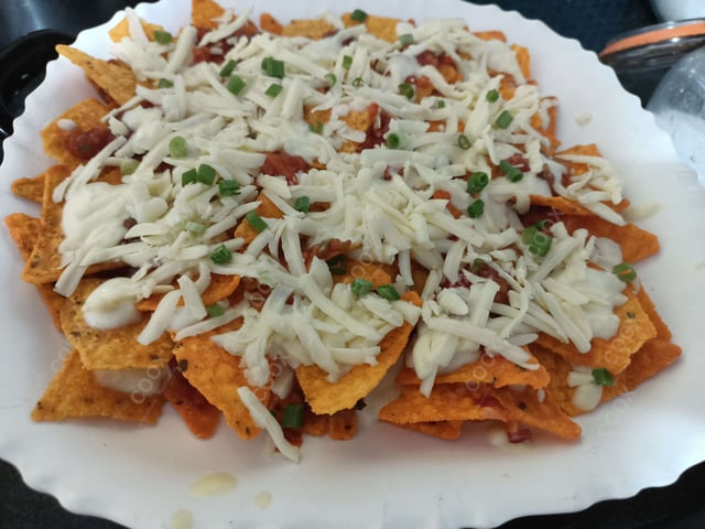 Delicious Cheese Nachos prepared by COOX