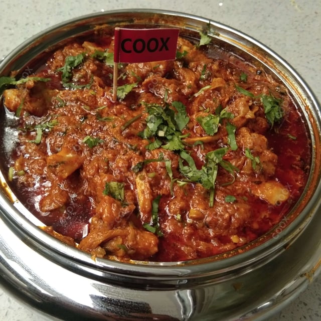 Delicious Mutton Rogan Josh prepared by COOX