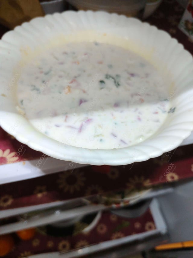 Delicious Mix Veg Raita prepared by COOX