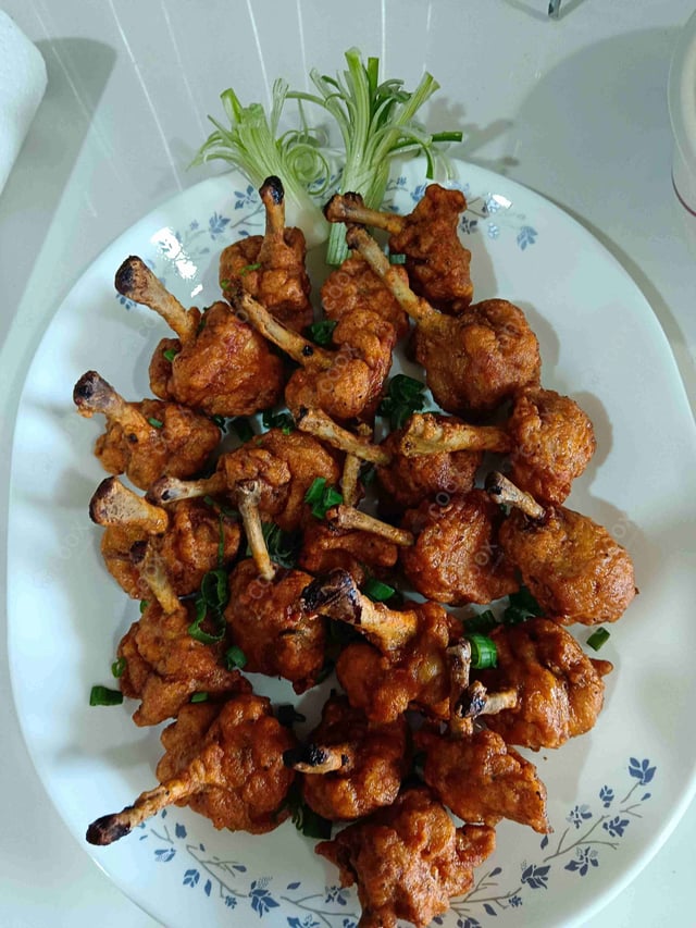 Delicious Chicken Lollipop prepared by COOX