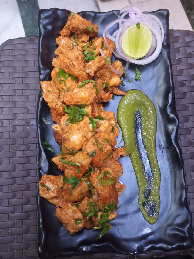 Delicious Chicken Tikka prepared by COOX