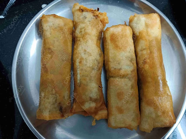 Delicious Veg Spring Rolls prepared by COOX