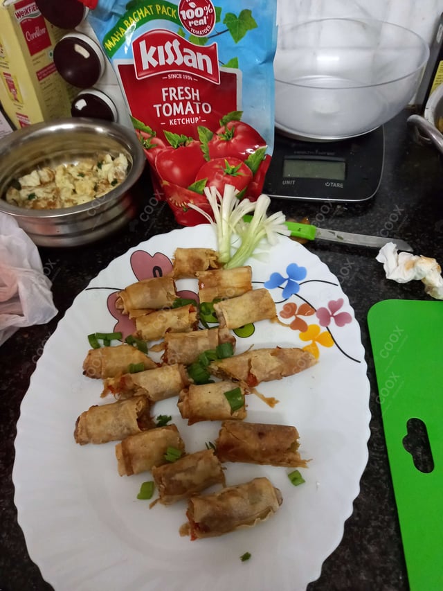 Delicious Chicken Spring Rolls prepared by COOX