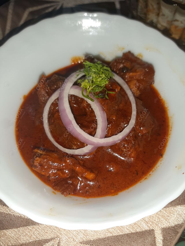 Delicious Mutton Rogan Josh prepared by COOX