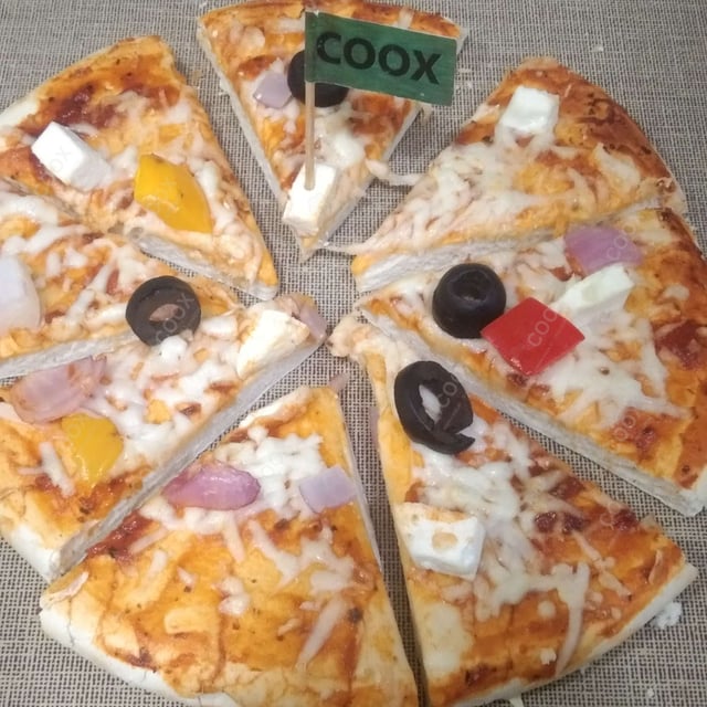 Delicious Veg Pizza prepared by COOX