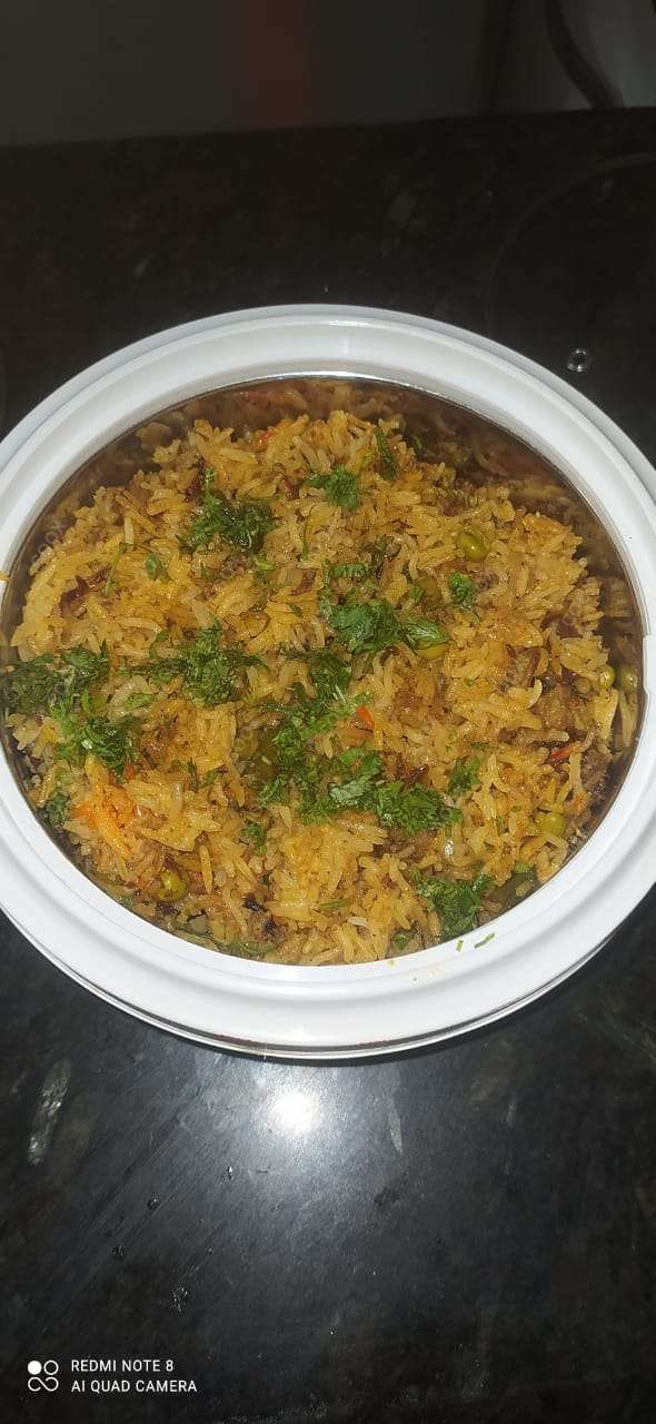 Delicious Veg Biryani prepared by COOX