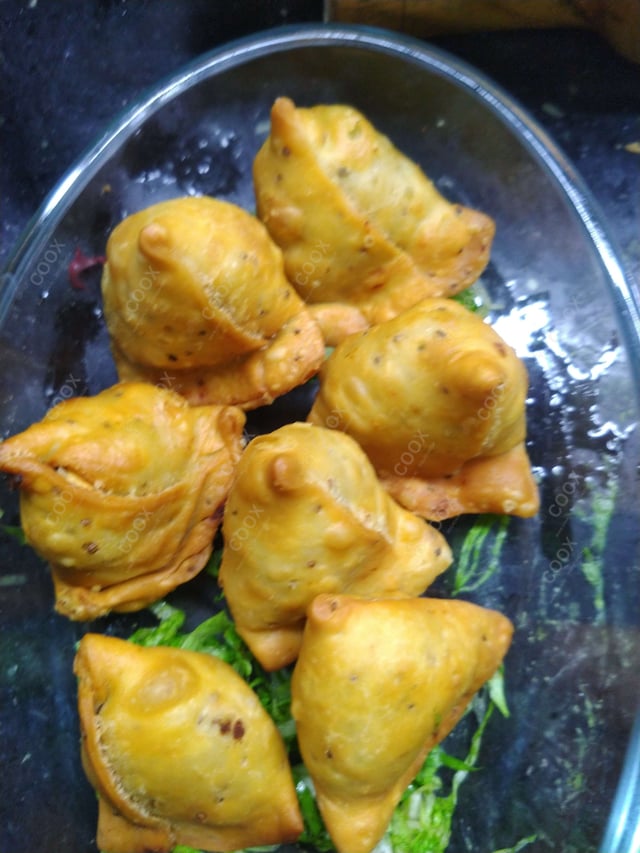 Delicious Mini Samosas prepared by COOX