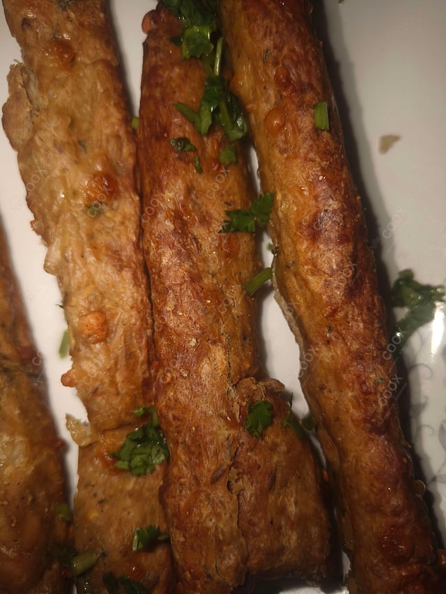 Delicious Chicken Seekh Kebab prepared by COOX