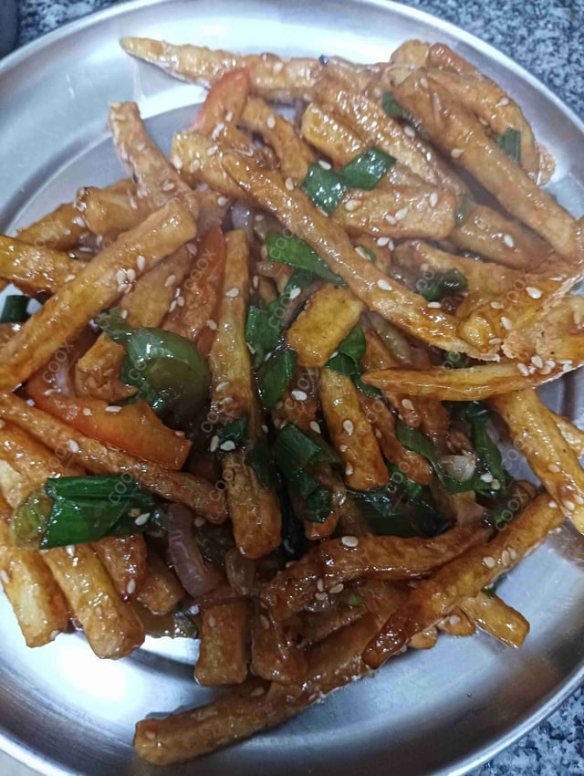 Delicious Honey Chilli Potato prepared by COOX