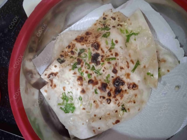 Delicious Naan (Butter / Garlic) prepared by COOX