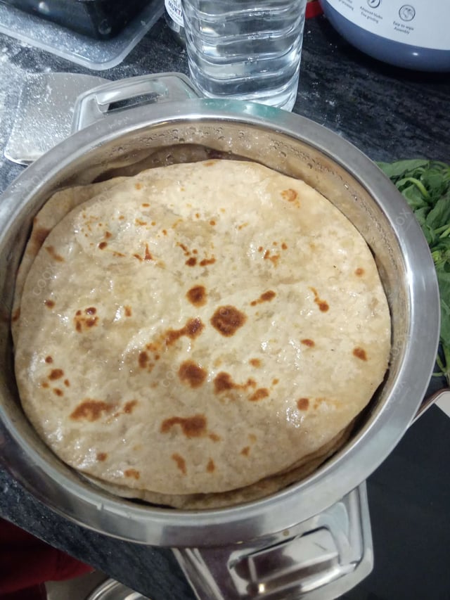 Delicious Tawa Rotis prepared by COOX