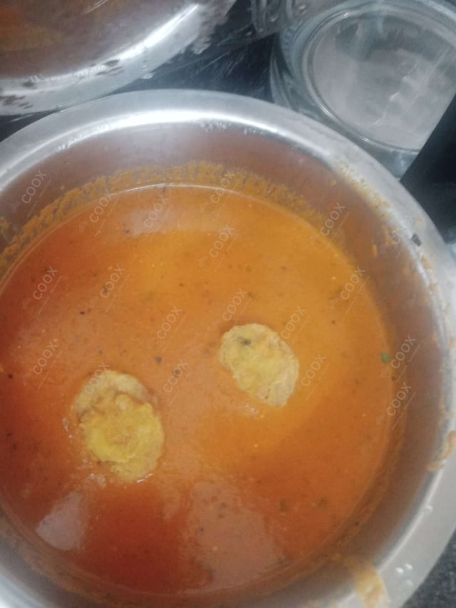 Delicious Dum Aloo prepared by COOX