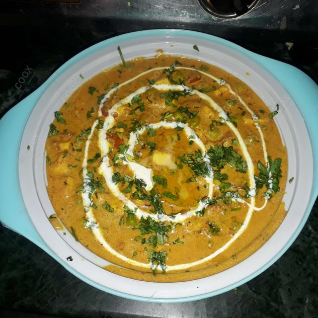 Delicious Matar Paneer prepared by COOX