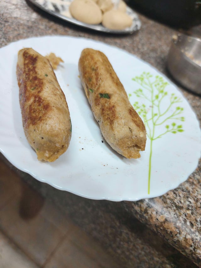 Delicious Chicken Seekh Kebab prepared by COOX