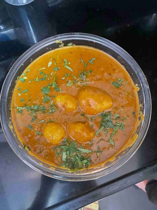 Delicious Dum Aloo prepared by COOX