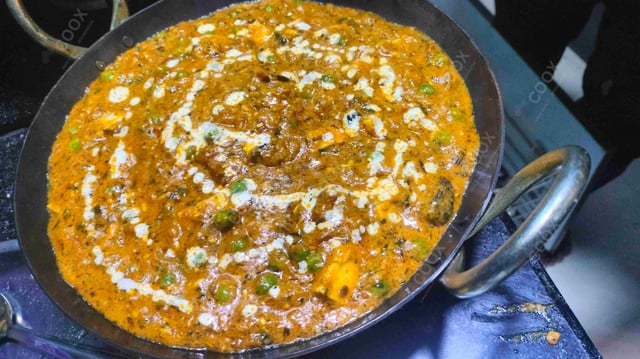 Delicious Matar Paneer prepared by COOX