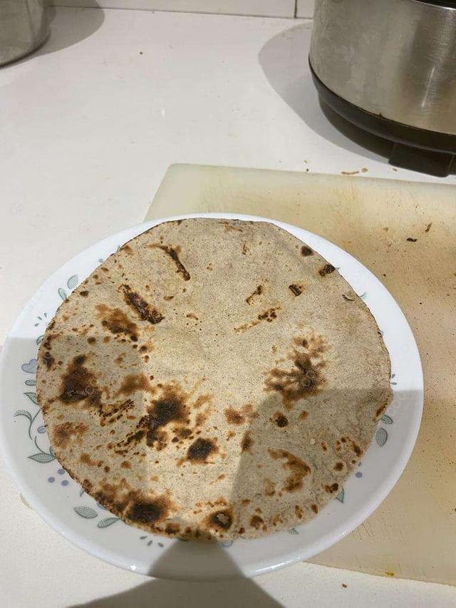 Delicious Tawa Rotis prepared by COOX