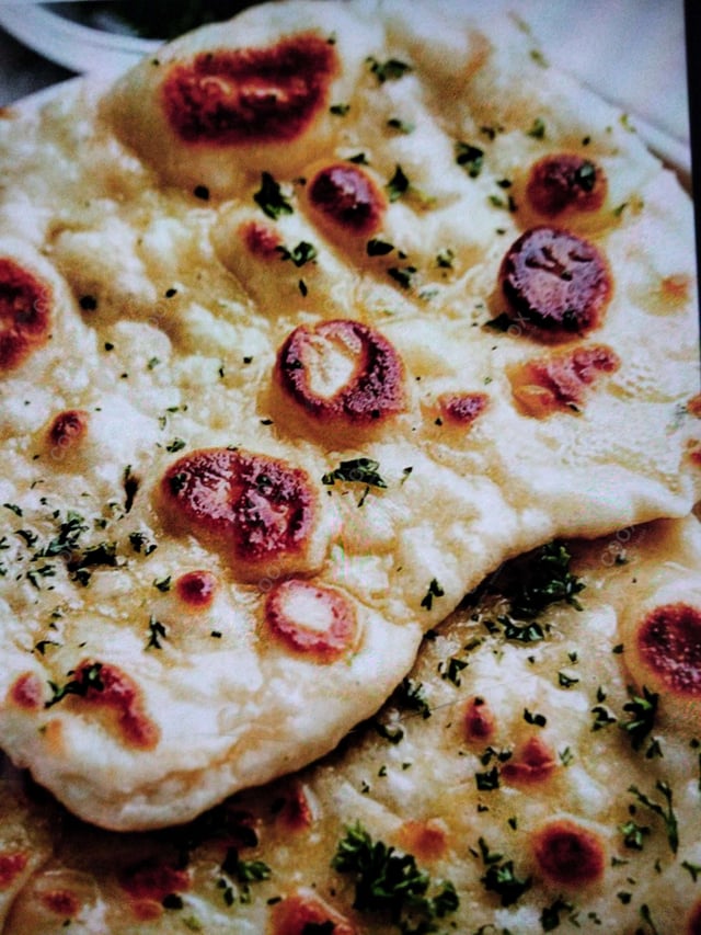 Delicious Naan (Butter / Garlic) prepared by COOX