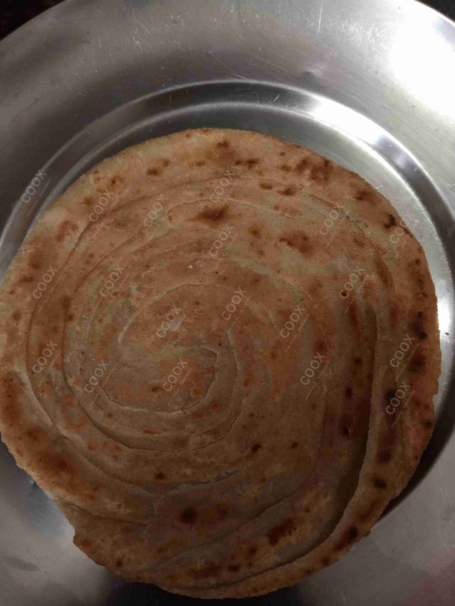 Delicious Lachha Parathas prepared by COOX