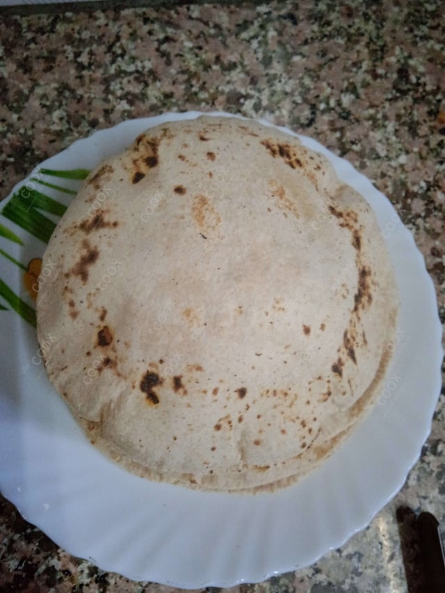 Delicious Tawa Rotis prepared by COOX