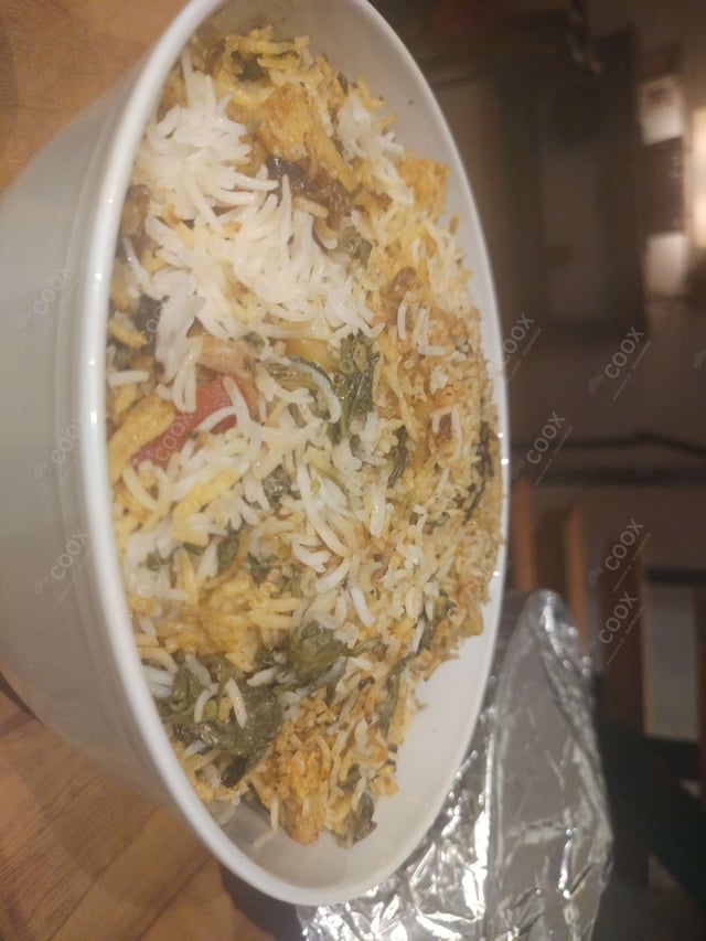 Delicious Veg Biryani prepared by COOX