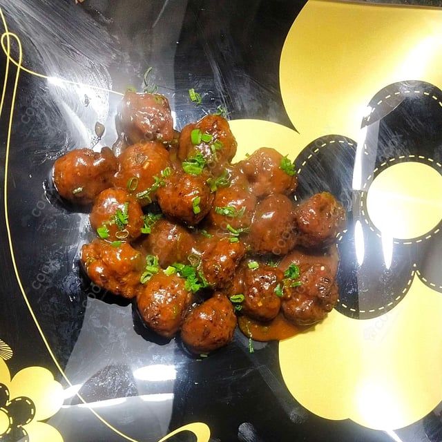 Delicious Veg Manchurian (Dry) prepared by COOX