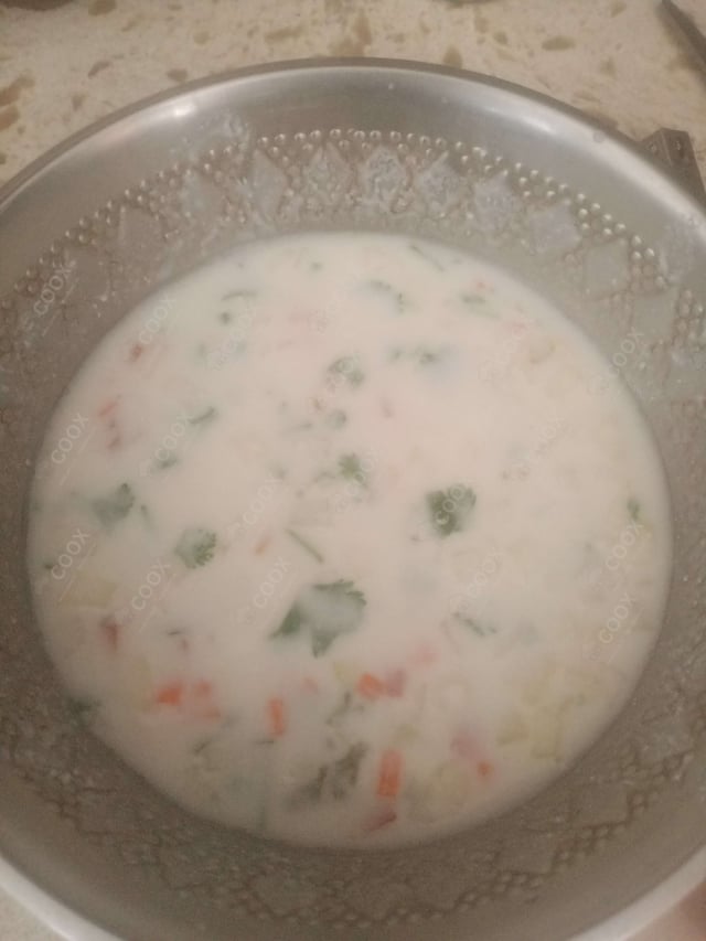 Delicious Mix Veg Raita prepared by COOX