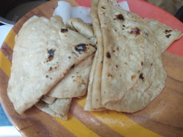 Delicious Tawa Rotis prepared by COOX