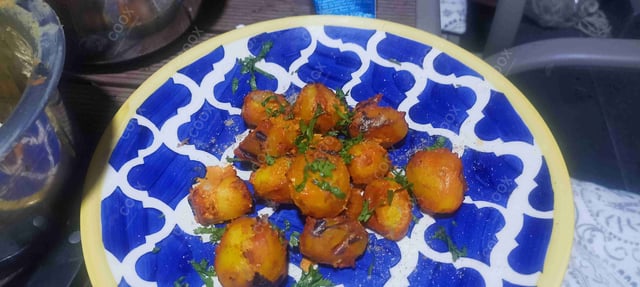 Delicious Tandoori Aloo prepared by COOX