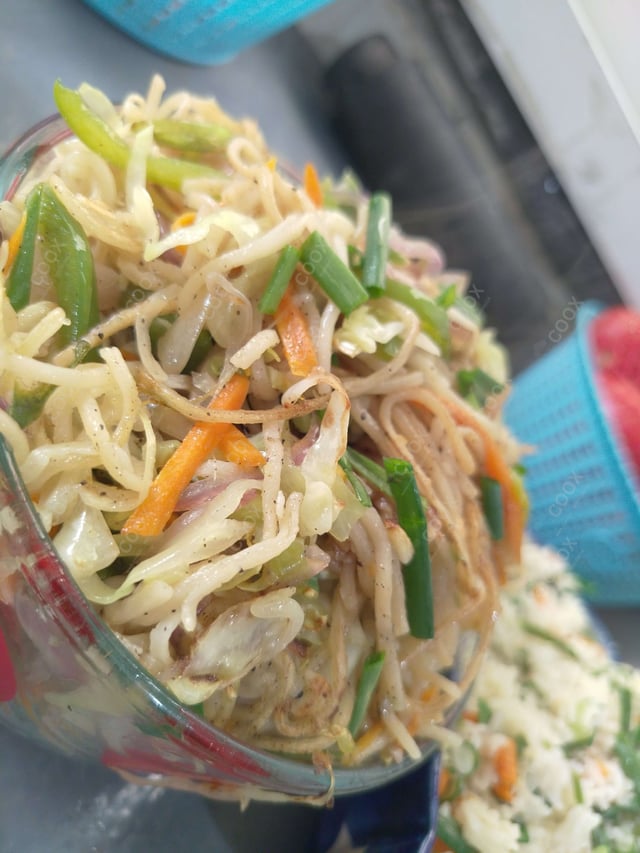 Delicious Veg Hakka Noodles prepared by COOX