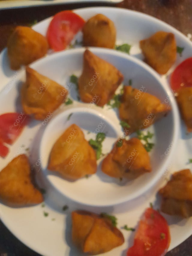 Delicious Mini Samosas prepared by COOX