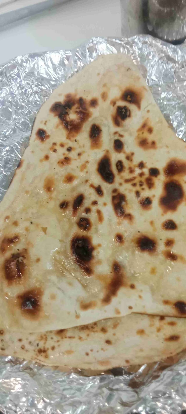 Delicious Naan (Butter / Garlic) prepared by COOX