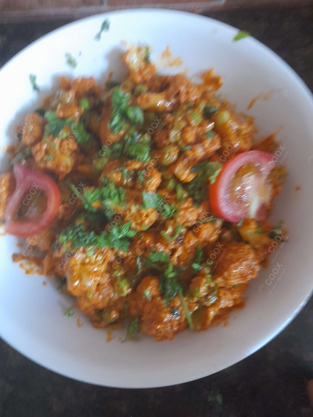 Delicious Gobhi Matar prepared by COOX