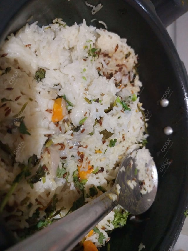 Delicious Jeera Rice prepared by COOX