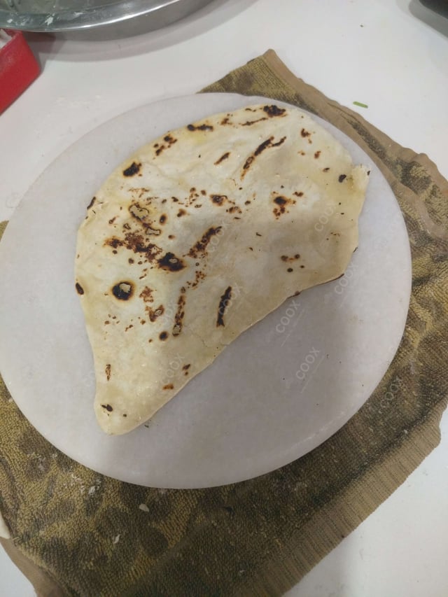 Delicious Naan (Butter / Garlic) prepared by COOX