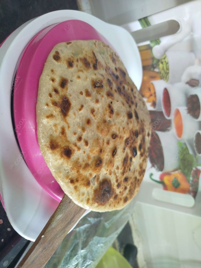 Delicious Stuffed Paranthas prepared by COOX