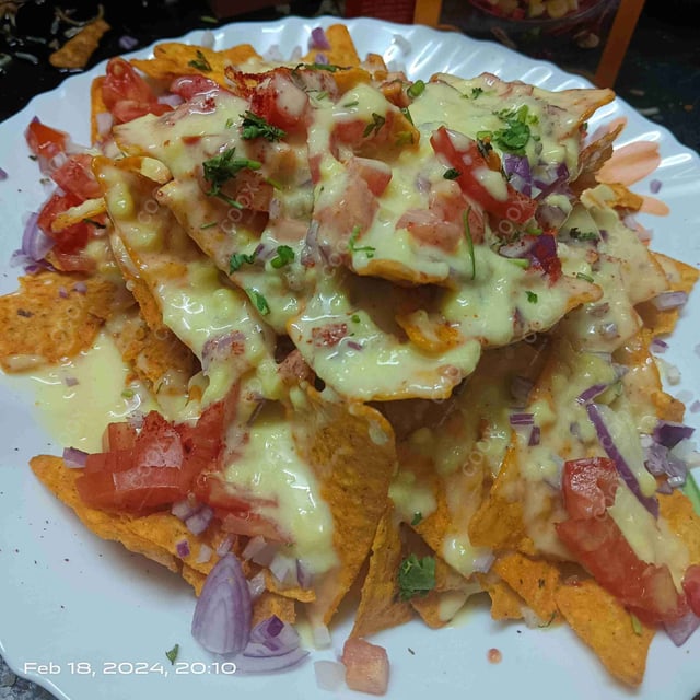 Delicious Cheese Nachos prepared by COOX