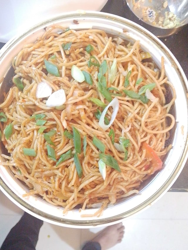 Delicious Veg Hakka Noodles prepared by COOX