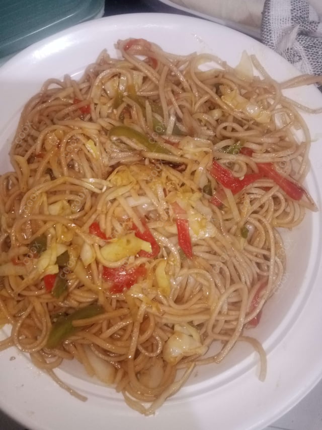 Delicious Veg Hakka Noodles prepared by COOX