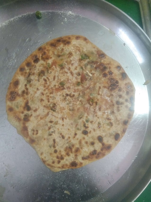 Delicious Stuffed Paranthas prepared by COOX