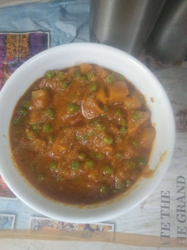 Delicious Matar Paneer prepared by COOX