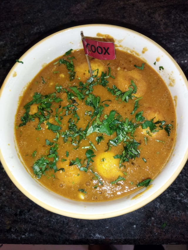 Delicious Egg Curry prepared by COOX