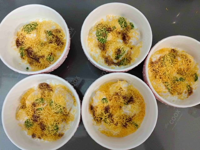 Delicious Dahi Bhalla prepared by COOX