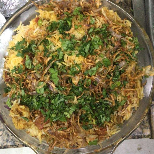 Delicious Veg Biryani prepared by COOX