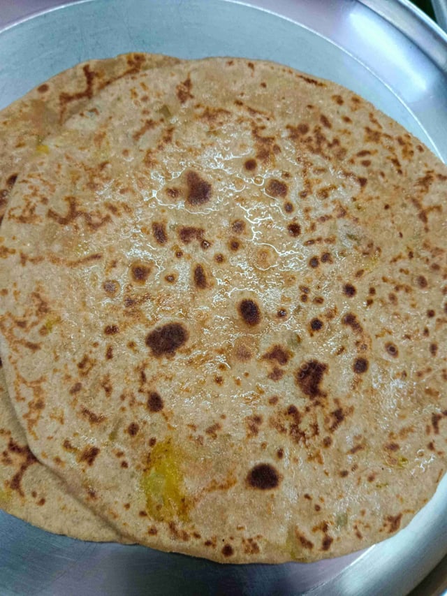 Delicious Stuffed Paranthas prepared by COOX