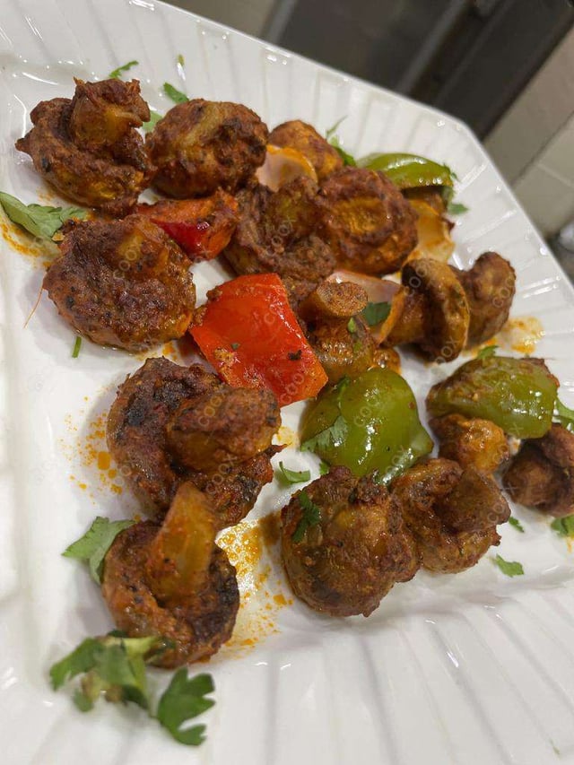 Delicious Mushroom Tikka prepared by COOX