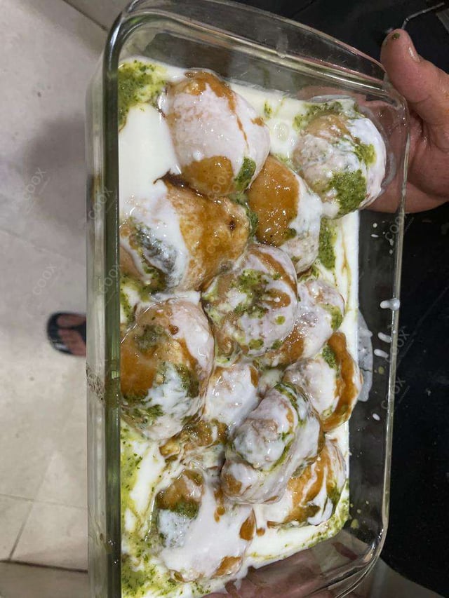 Delicious Dahi Bhalla prepared by COOX