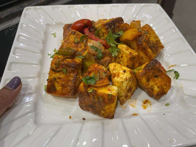 Delicious Paneer Tikka prepared by COOX