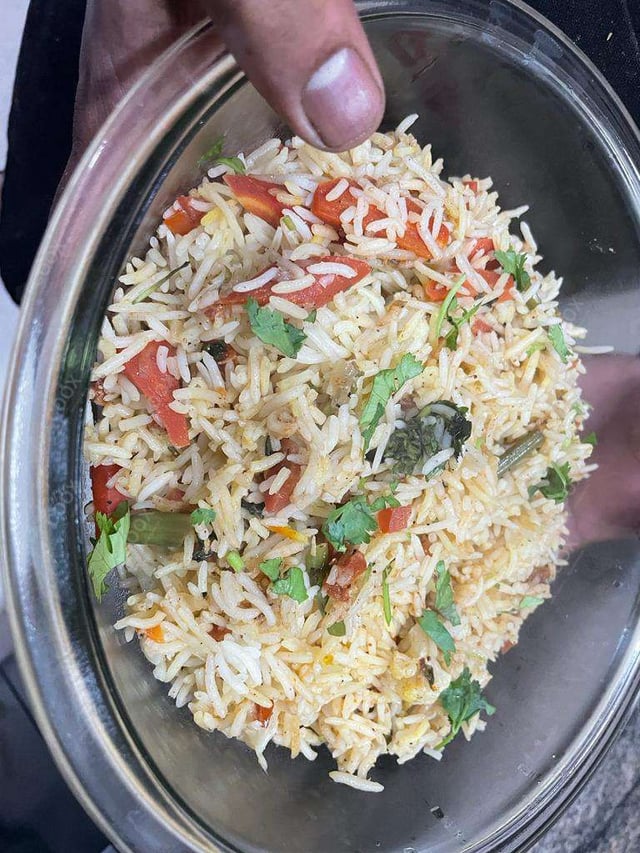 Delicious Veg Biryani prepared by COOX